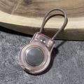 Apple AirTag/AirTag 2-etui med rustfritt stålreim - gjennomsiktig rosa