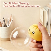 Dumpling squishy antistress-leke som blåser bobler, med dampkurv - gul