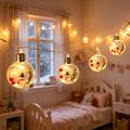 LED-lyskjede med julenissemotiv og gjennomsiktige kuler – 10 varmhvite LED-pærer – 2m