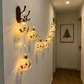 LED-lyskjede med julenissemotiv og gjennomsiktige kuler – 10 varmhvite LED-pærer – 2m