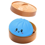 Squishy-leketøy mot stress i form av en dumpling med dampkoker-eske