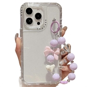 iPhone 16 Pro Max Glitter støtsikkert hybriddeksel med håndleddsstropp - gjennomsiktig