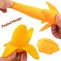 Skrellbar mango-dumpling squishy-leke for barn og voksne