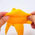 Skrellbar mango-dumpling squishy-leke for barn og voksne