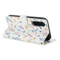 Samsung Galaxy A57 Rombisk blomsterlommebok-etui - fargerike blomster