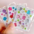 Selvklebende klistremerker med rhinestone-krystaller – hjerte