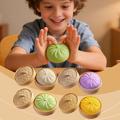 Ensfarget dumpling squishy stressleke med dampkurv - grønn