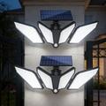 YY-22226 LED-solcellelampe med 4 lyshoder og PIR-bevegelsessensor - 800 lumen
