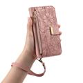 iPhone 16 lommebokveske med blomster- og bladmønster, glidelåslomme og håndleddsstropp