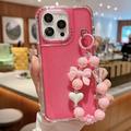 iPhone 16 Pro Glitter støtsikkert hybriddeksel med håndleddsstropp - Varm Rosa