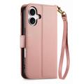 iPhone 17 lommebokveske med blomster- og bladmønster, glidelåslomme og håndleddsstropp - rosa