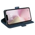 iPhone 16e lommebokveske med magnetisk lukking - kalvestruktur - blå